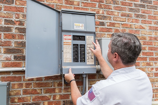 electrician working on panels