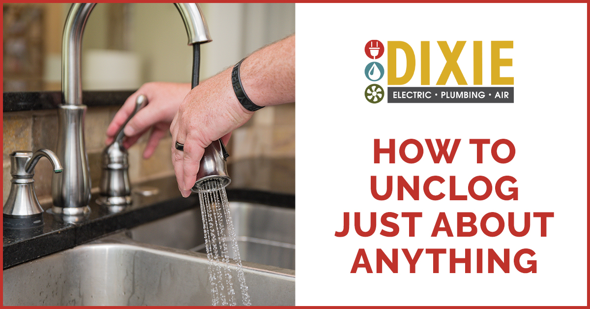 Dixie Electric, Plumbing & Air technician repairing a clogged sink