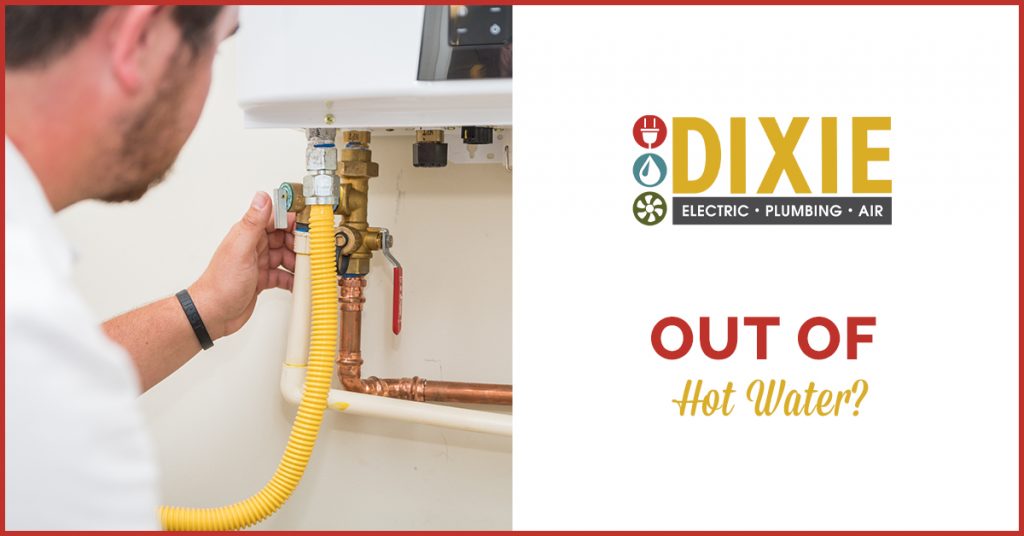 Dixie Electric, Plumbing & Air plumber inspecting hot water valve